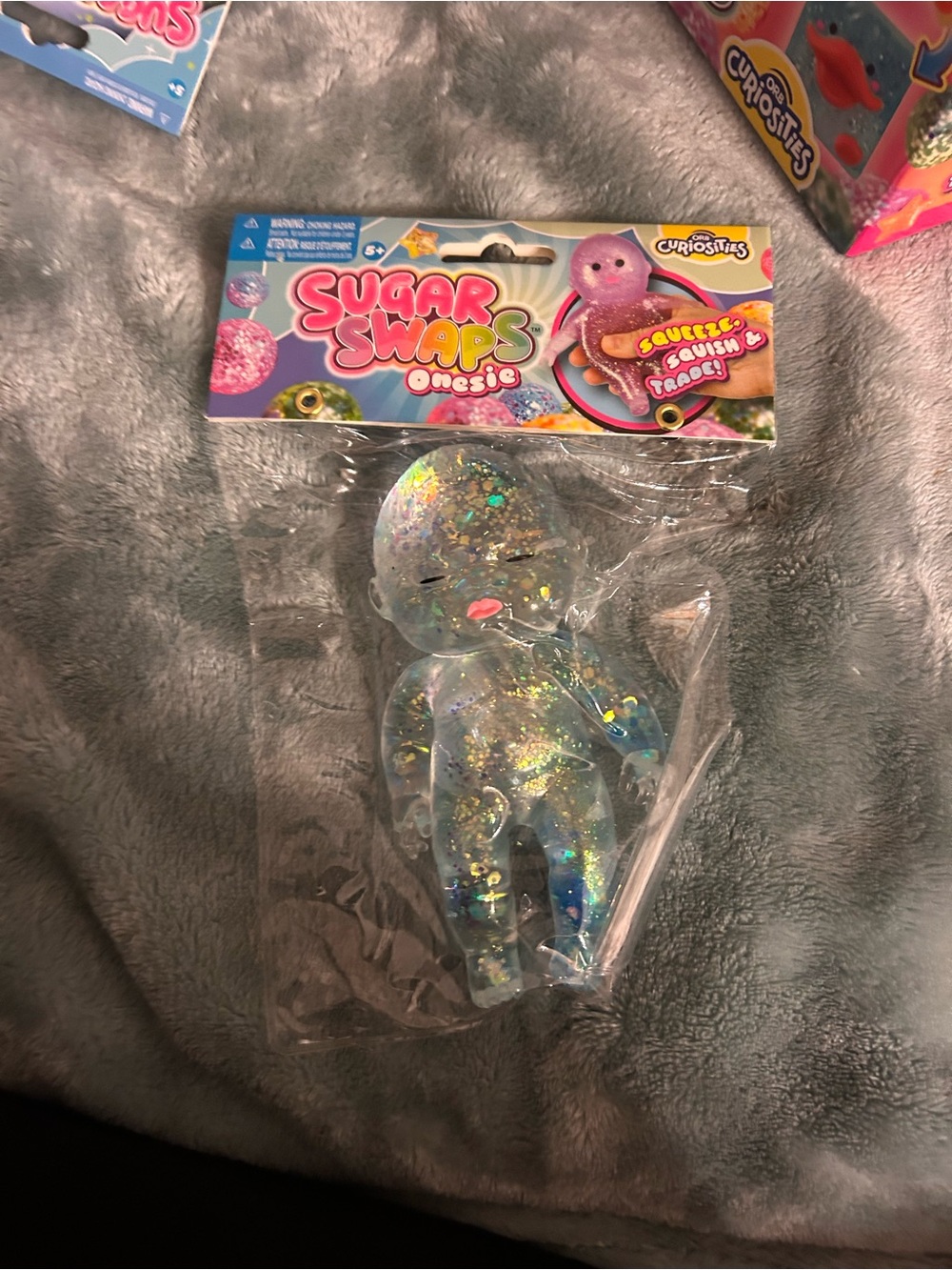 Sugar Swaps Opesie Glitter Clear Squishy Toy - Clear